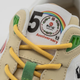 The 50th anniversary logo has the ramen chain's logo in the 0.
